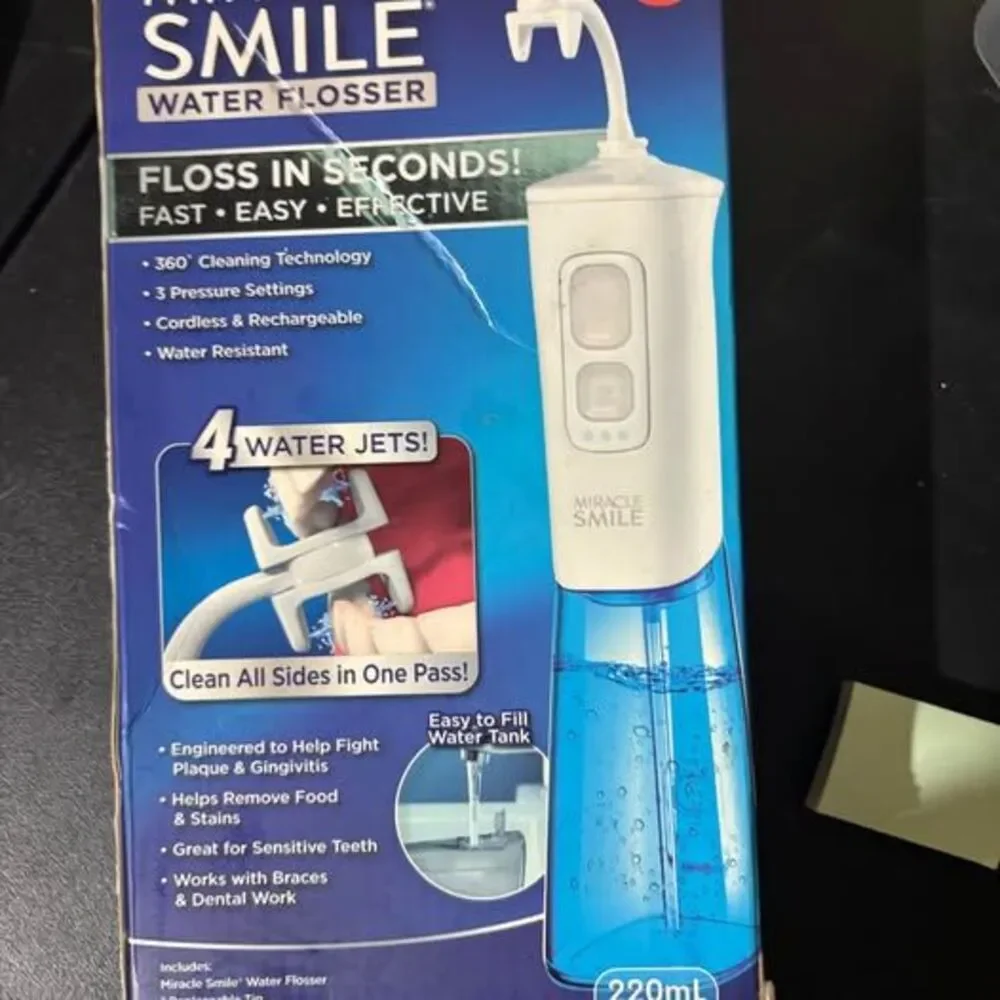 Miracle Smile Water Flosser 4-Jet Cordless Rechargeable Oral Irrigator